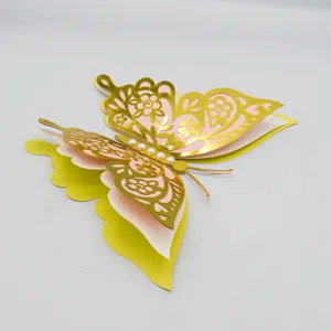Exquisite 3D layered hollow butterfly wall sticker with pearl decoration for wedding home decor.