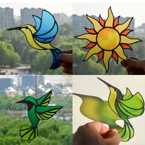 Stained glass hummingbird and sun suncatcher acrylic hanging pendant for window decor detail.