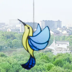 Handcrafted stained glass hummingbird suncatcher acrylic hanging pendant for window home decor.