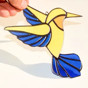 Stained glass style acrylic hummingbird suncatcher detail, vibrant hanging window decor.