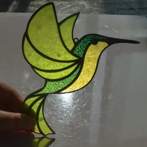 Detailed view of stained glass hummingbird suncatcher hanging pendant ornament decor