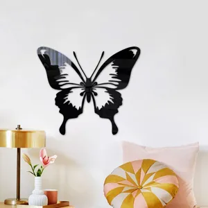 Close-up of 3D hollow butterfly acrylic mirror wall sticker in a cozy home interior setting.