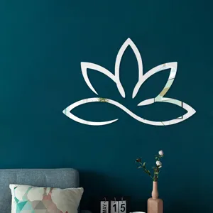 Detailed scene showing 3D acrylic lotus flower mirror wall sticker mounted on dark teal wall.