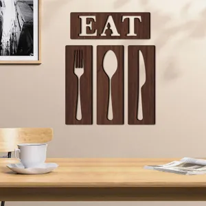 Décoration murale créative EAT en bois avec motif couverts pour cuisine et salle à manger.