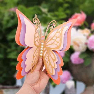 Detailed close-up of 3D layered hollow butterfly wall sticker with pearls for decor.