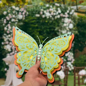 Detailed view of 3D layered hollow paper butterfly wall sticker with pearl decorations.