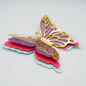 3D layered hollow paper butterfly wall sticker with pearl decor for home and wedding decor.