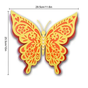 Detailed close-up of 3D layered hollow paper butterfly wall decor with pearl accents.