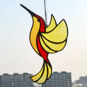 Stained glass hummingbird suncatcher pendant, colorful hanging decor for window and home.