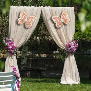 3D hollow pearlescent paper butterfly wall stickers for elegant wedding party decoration.