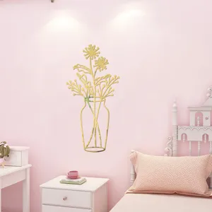 3D acrylic mirror wall sticker in gold vase and flower shape for home decor detail.