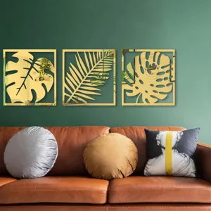 Gold acrylic monstera leaf mirror wall stickers detail view, modern home decor for living room.
