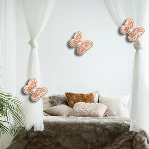 Detailed scene view of 3D hollow butterfly wall stickers in a cozy bedroom decor style.