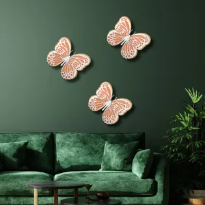 Detailed scene showing 3D hollow butterfly wall stickers decorating a dark green living room wall.