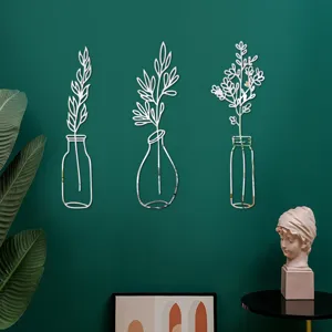 Detail view of 3D acrylic mirror wall sticker with modern vase and plant branch designs.