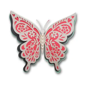 Detailed view of 3D layered hollow pearl paper butterfly decoration, elegant craft sticker.