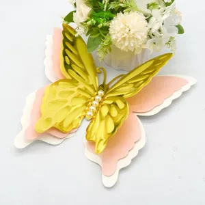 3D gold hollow butterfly wall sticker detail, multi-layer pearl paper decor for home and party.