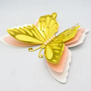 3D hollow butterfly wall sticker with multi-layer pearl paper and beads for home decor.