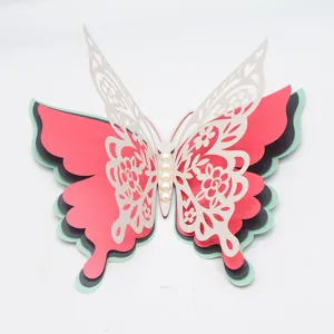 3D four-layer hollow pearlescent paper butterfly wall sticker for wedding and party decoration.