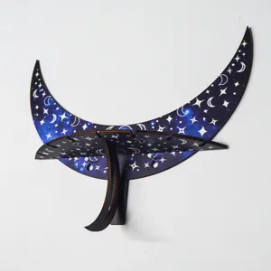 Wooden crescent moon wall shelf with starry night print for boho home decor and crystal display.