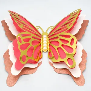 Exquisite 3D layered hollow butterfly wall sticker with gold edges and elegant pearl decor.