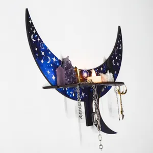 Detailed view of the crescent moon wooden shelf with starry galaxy pattern and crystal decor.