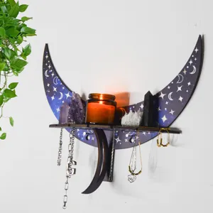 Detailed view of a wooden moon wall shelf with star pattern, perfect for crystal and jewelry storage.
