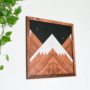 Nordic wooden framed geometric mountain wall art detail, modern home living room decor.