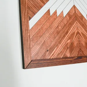 Close-up detail of Nordic wooden geometric wall art, showing natural wood grain and craftsmanship.