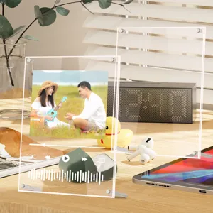 Clear acrylic photo frame with metal stand, double layer transparent desktop picture display.
