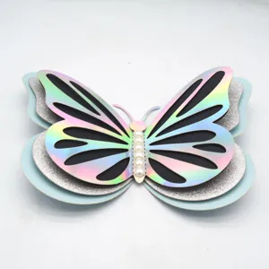 Detailed view of 3D multi-layer holographic butterfly wall sticker with pearls for decor.