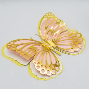 Close-up detail of the 3D four-layer metallic gold paper butterfly wall sticker decor.