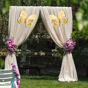 Close up scene detail of 3D hollow butterfly wall sticker for wedding party decor.