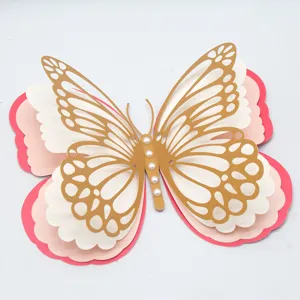 3D layered hollow pearlescent paper butterfly wall sticker detail, elegant gold white pink design