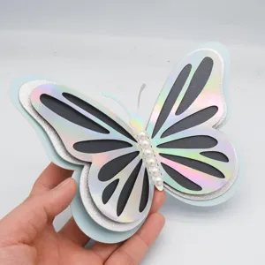 Close-up detail of the 3D hollow butterfly wall sticker featuring shimmering layers and pearls.