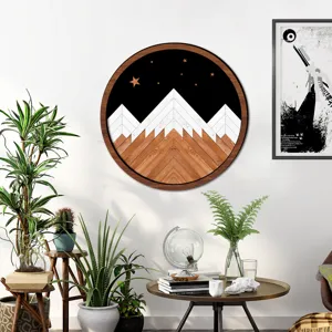 Nordic style circular wooden framed wall art featuring geometric mountain and star pattern.