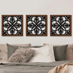 Detailed lifestyle scene showing three wooden hollow wall art panels mounted above a cozy bed.