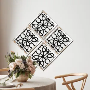Detailed view of the 4-piece diamond wooden hollow floral wall art hanging on a clean wall.