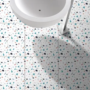 Close-up view of self-adhesive terrazzo floor sticker with colorful chips for decor.