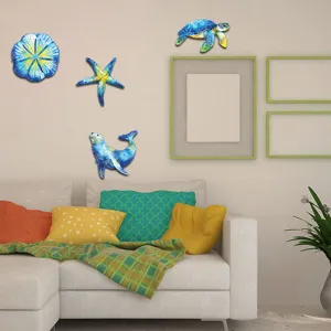 Metal marine wall art detail showing ocean creature hanging decorations in a cozy living room.