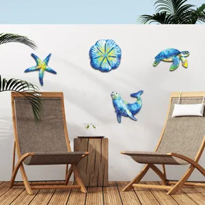 Detailed view of metal ocean animal wall hanging decor featuring sea turtle and starfish design.