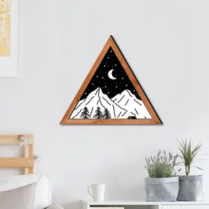 Detailed view of Nordic style triangular wooden framed wall art with night mountain scene mockup.