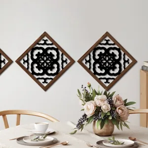 Wooden hollow wall decor detail showcasing intricate black pattern inside wood grain frame.