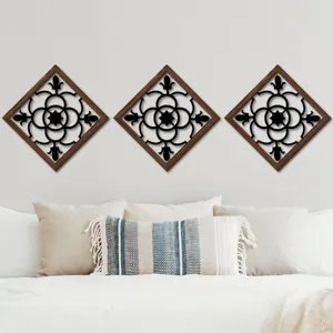 Set of three diamond-shaped wooden hollow wall art decor displayed in a modern cozy bedroom.