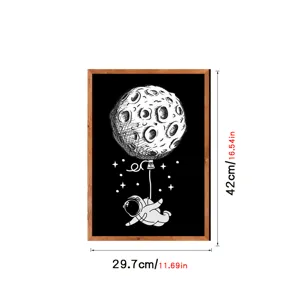 Nordic wood framed canvas wall art featuring astronaut and moon balloon design detail.
