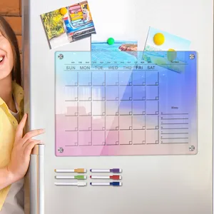 Magnetic acrylic calendar board for fridge with dry erase markers and colorful gradient design.