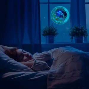 Glow in the dark porthole wall sticker, luminous marine animal scene for kids room decor.