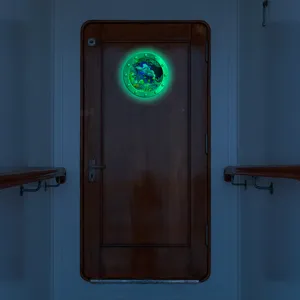 Luminous porthole wall sticker, glowing marine animal sea turtle design for home decor.