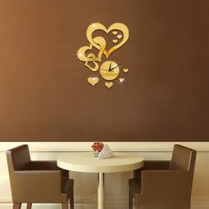 Gold mirror acrylic heart wall clock for interior room wall decor, modern design style.