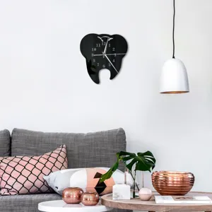 Modern black tooth-shaped wall clock scene showcasing creative home decor and wall design details.
